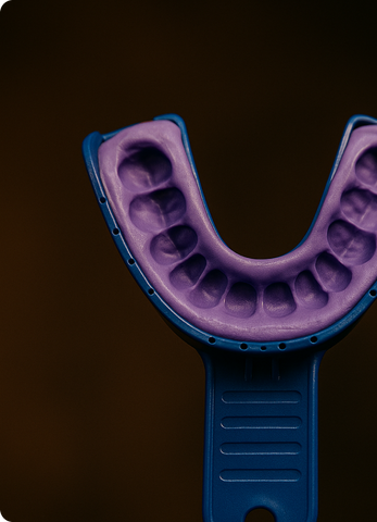 Center the tray on your teeth, press gently (don’t bite), let it set, then pull it straight off. Grillz